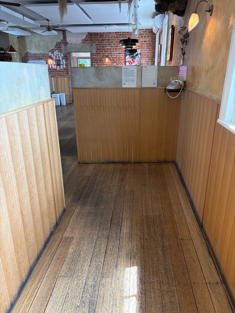 First timber-floored walkway inside the venue. Width: 1,390 mm.